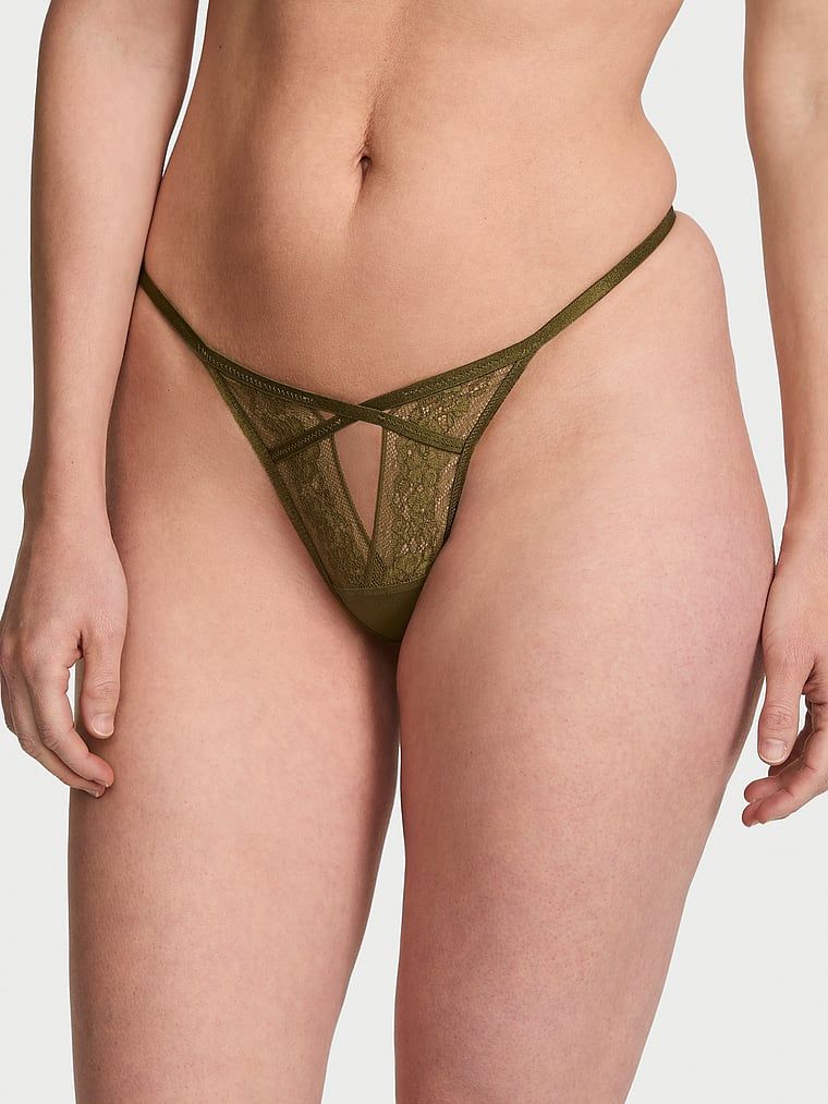 Tanga cu decupaj și dantelă cu bretele. Produsul este de culoare verde și provine din colecția Very Sexy.