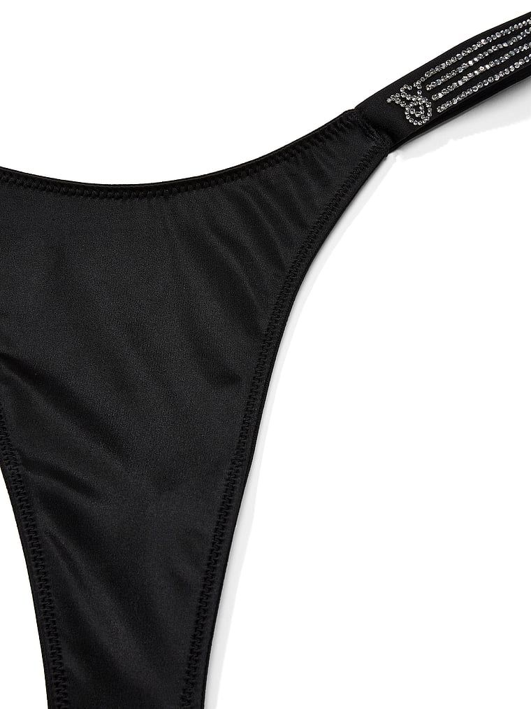 Tanga cu bretele Shiny Stripe Shine. Produsul este negru și provine din colecția Very Sexy.