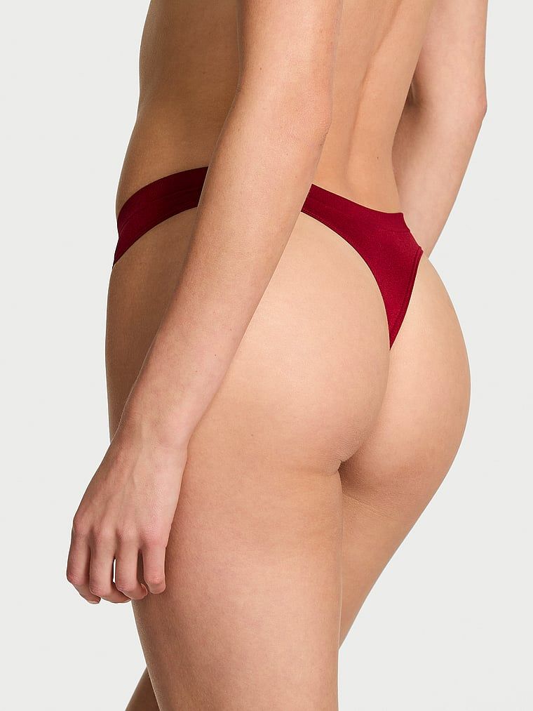 Tanga fără cusături Shine. Produsul este de culoare roșie și provine din colecția Seamless