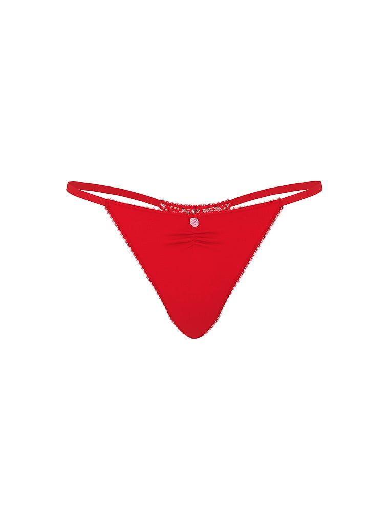 Tanga de bumbac cu dantelă la spate, dantelă în formă de inimă. Produsul este roșu și provine din colecția Victoria's Secret.