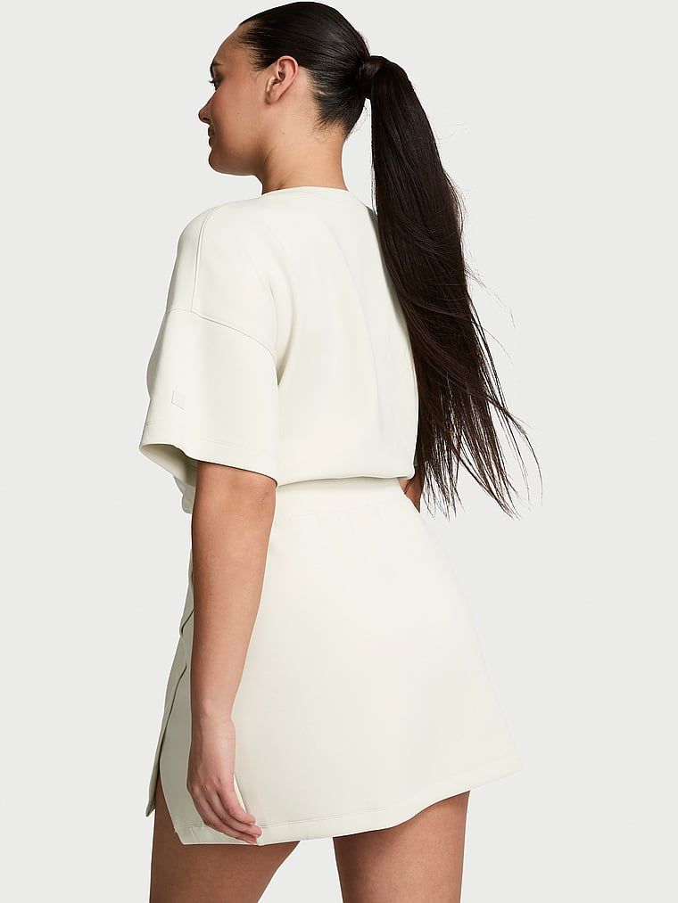 Rochie mini VSX Featherweight Knit. Produsul este bej și provine din colecția VSX.