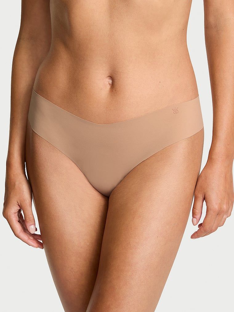 Tanga fără sudură fără prezentare. Produsul este de culoare bej și provine din colecția No-Show.