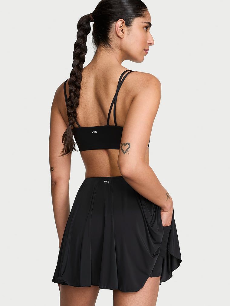 Fustă sport de tenis cu pantaloni scurți VSX Elevate Sheer Radiance. Produsul este negru și provine din colecția VSX.