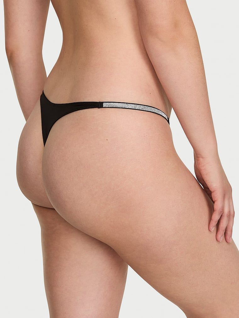 Tanga Shine Bow. Produsul este negru și provine din colecția Very Sexy.