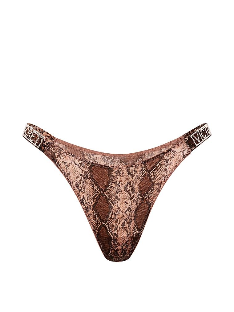Chiloți brazilieni din dantelă cu dungi braziliene Shine Strap. Produsul are o culoare cu model și provine din colecția Very Sexy.