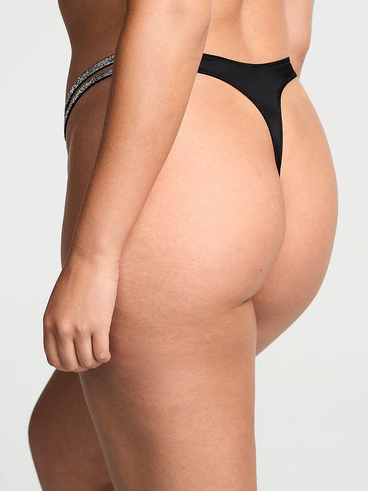 Tanga cu curea dublă strălucire. Produsul este negru și provine din colecția Very Sexy.