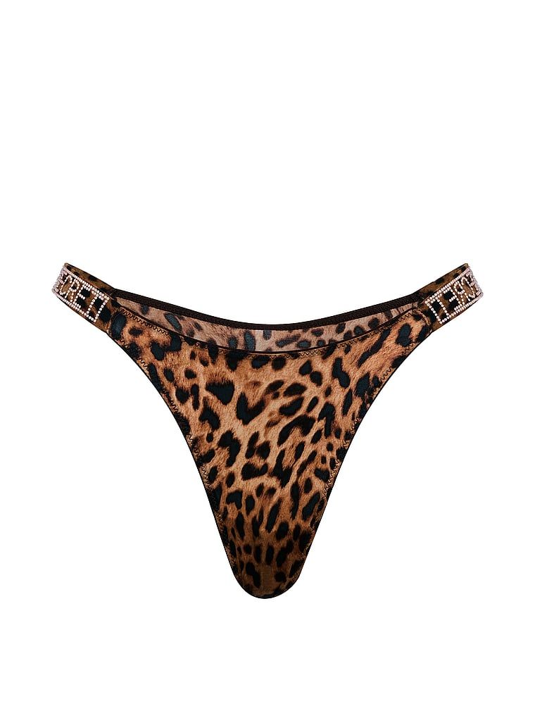Chiloți brazilieni din dantelă cu dungi braziliene Shine Strap. Produsul are o culoare cu model și provine din colecția Very Sexy.