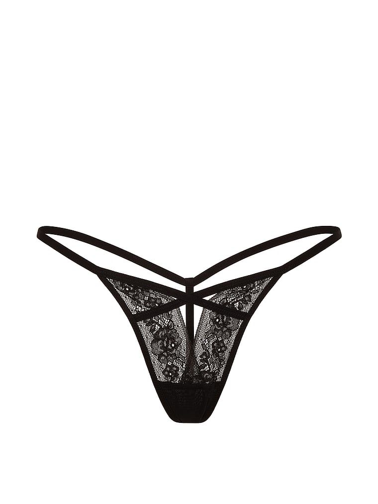 Tanga cu decupaj și dantelă cu bretele. Produsul este negru și provine din colecția Very Sexy.