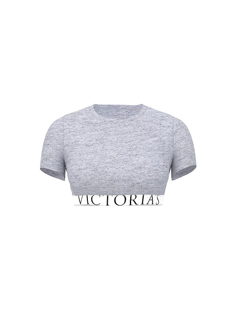 Crop top din bumbac cu mâneci scurte. Produsul este de culoare gri și provine din colecția de tricouri.