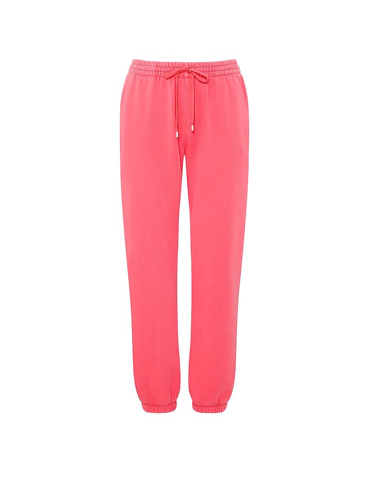 Pantaloni de trening din bumbac în afara serviciului. Produsul este roz și provine din colecția Angel Essentials.