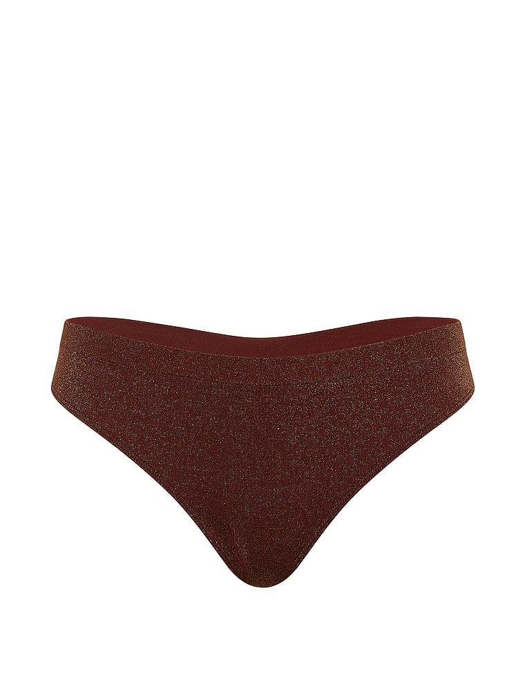 Tanga din material strălucitor de Shimmer. Produsul este de culoare maro și provine din colecția Seamless (Seamless Collection).