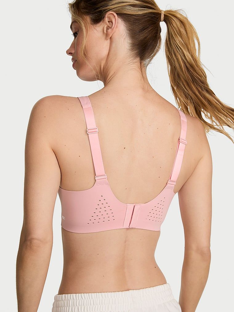 Sutien sport VSX Featherweight Max Maximum Support. Produsul este roz și provine din colecția VSX.
