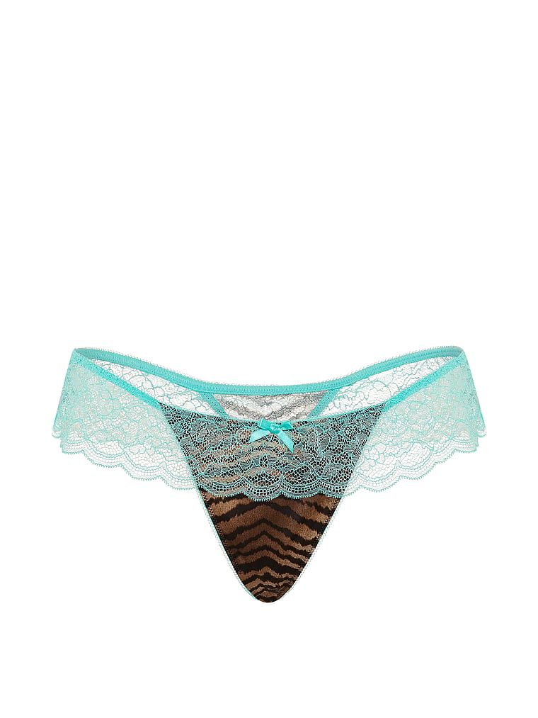 Tanga de satin cu volane și tachină. Produsul are imprimeu color și provine din colecția Victoria's Secret.