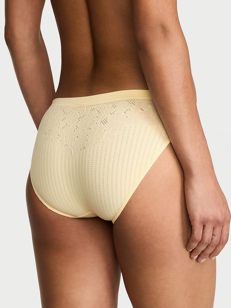 Chiloți de bikini cu pește cu flori. Produsul este de culoare galbenă și provine din colecția Seamless (Seamless Collection).