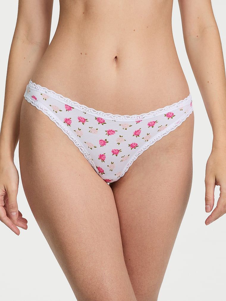 Tanga din bumbac cu dantelă pe marginile din dantelă. Produsul are un model floral și provine din colecția Lacie.