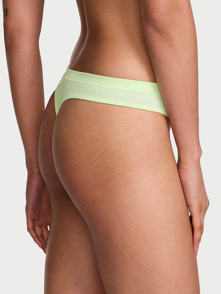Tanga, coaste transparente fără cusură. Produsul este de culoare verde și provine din colecția Seamless (Seamless Collection).