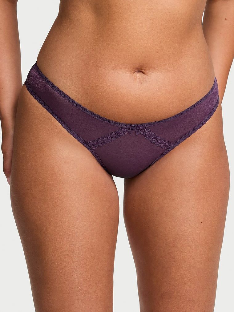 Shimmer Shimmer Shimmer Shiny Thong. Produsul este de culoare mov și provine din colecția Dream Angels.