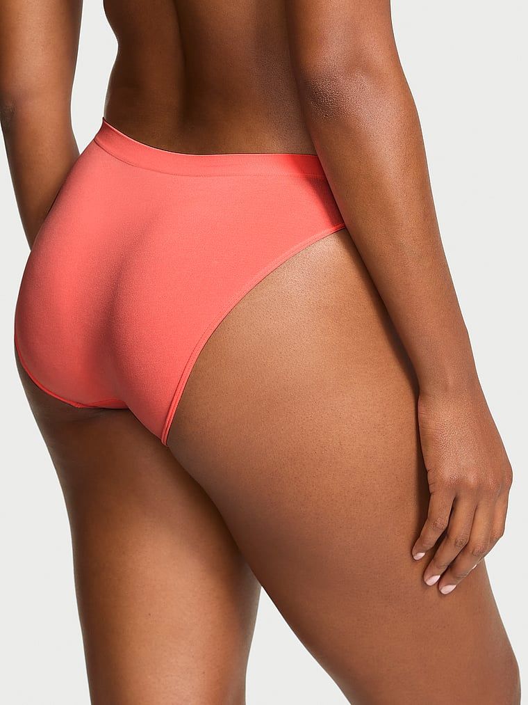 Chiloți de bikini fără cusături. Produsul este portocaliu și provine din colecția Seamless (Seamless Collection).