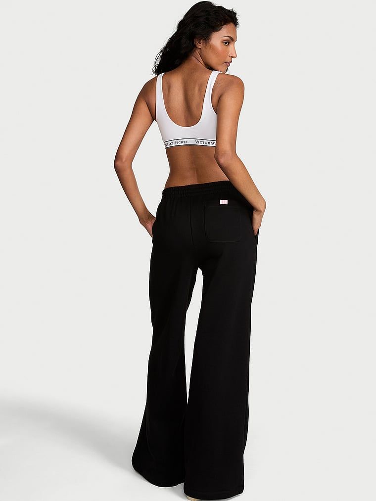 Pantaloni de trening iconici din bumbac. Produsul este negru și provine din colecția Angel Essentials.