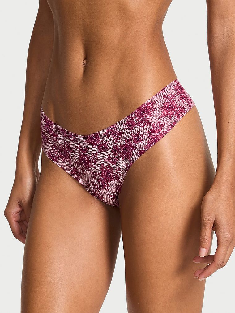Tanga fără sudură fără prezentare. Produsul este de culoare florală și provine din colecția No-Show.