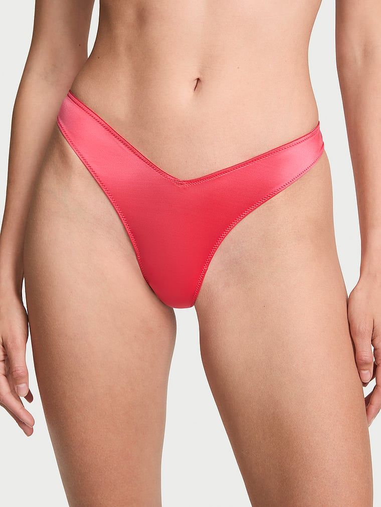 Tanga cu bretele la spate și picior înalt cu strappy-back. Produsul este roșu și provine din colecția Very Sexy.