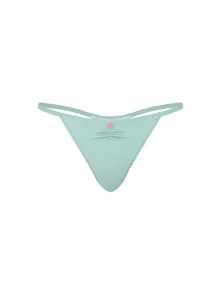 Tanga de bumbac cu dantelă la spate, dantelă în formă de inimă. Produsul este albastru și provine din colecția Victoria's Secret.