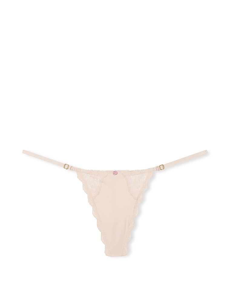 Tanga din dantelă cu bretele reglabile Lace-Trim V-String. Produsul este bej și provine din colecția Dream Angels.