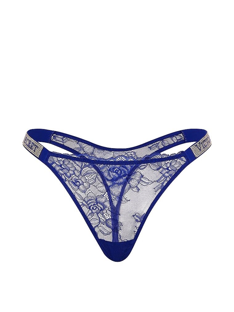 Tanga din dantelă cu bretele lucioase Shine Strap. Produsul este de culoare albastră și provine din colecția Very Sexy.