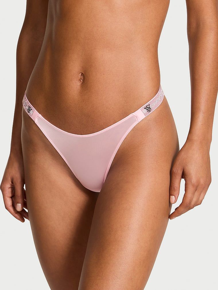 Tanga cu curele strălucitoare Shine Trap. Produsul este de culoare roz și provine din colecția Very Sexy.