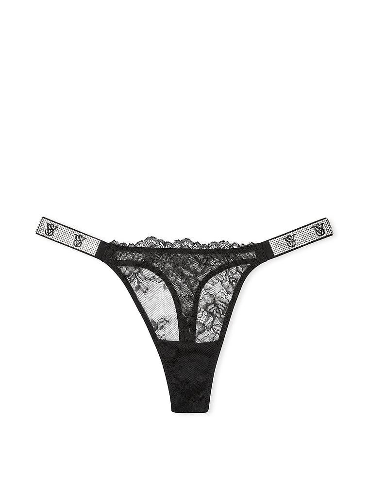 Tanga Shine Strap Rose Lace. Produsul este negru și provine din colecția Body by Victoria.