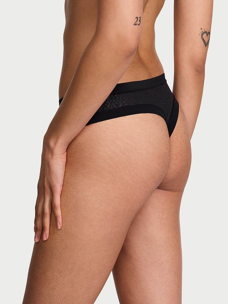 Tanga cu Leopard cu imprimeu de leopard, care nu apare. Produsul este negru și provine din colecția No-Show.