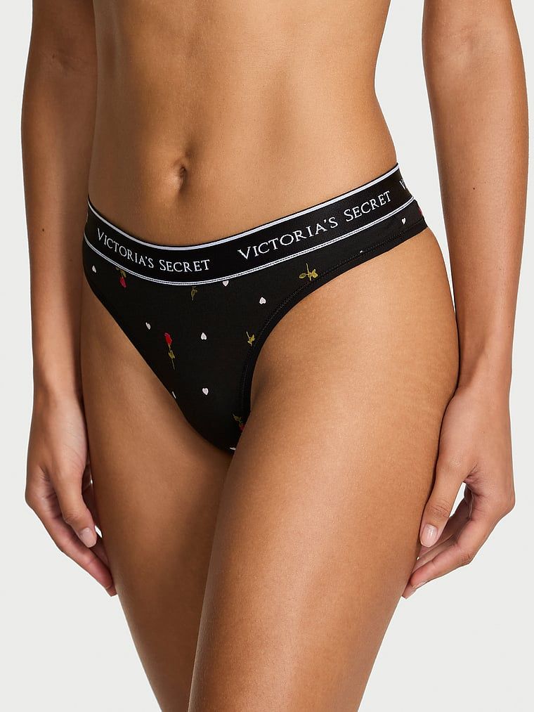 Tanga de bumbac cu logo la talie. Produsul are o culoare florală și provine din colecția Bumbac.