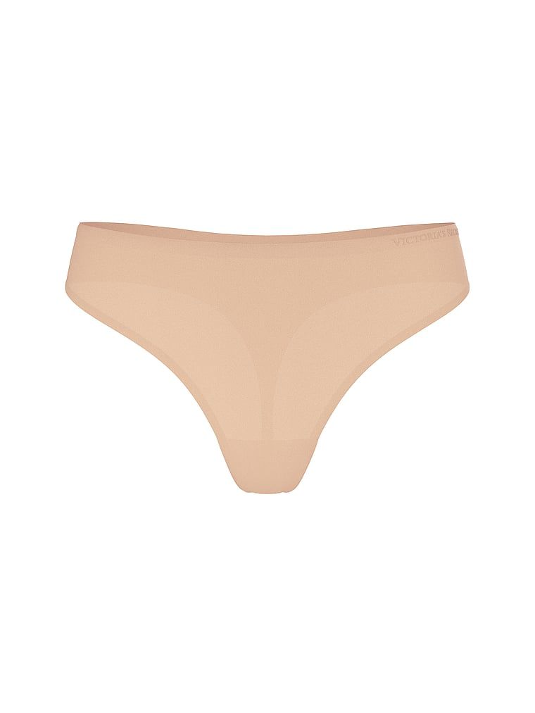 Tanga din microfibră flexibilă. Produsul este bej și provine din colecția Body by Victoria.