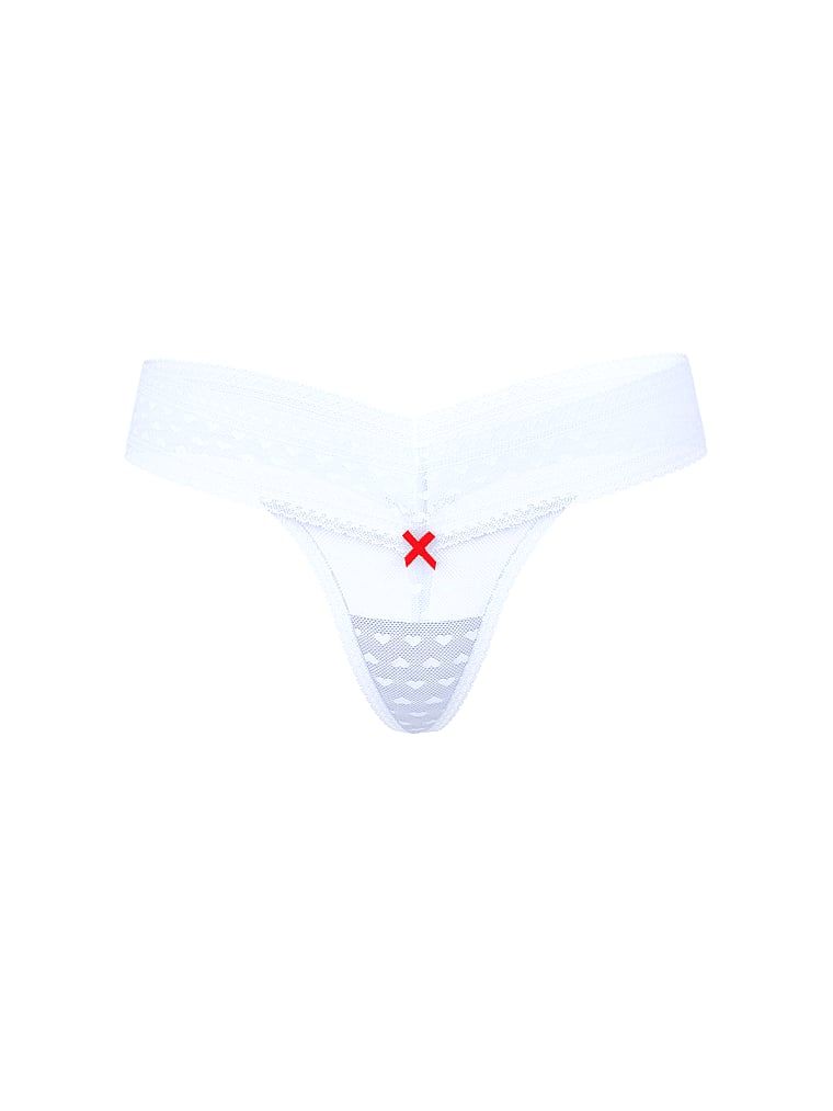 Tanga din plasă cu dantelă în formă de inimă. Produsul este de culoare mov și provine din colecția Lacie.
