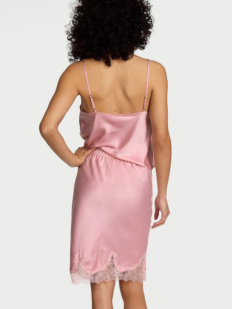 Fustă de satin finisată cu dantelă. Produsul este roz și provine din colecția Dream Angels.