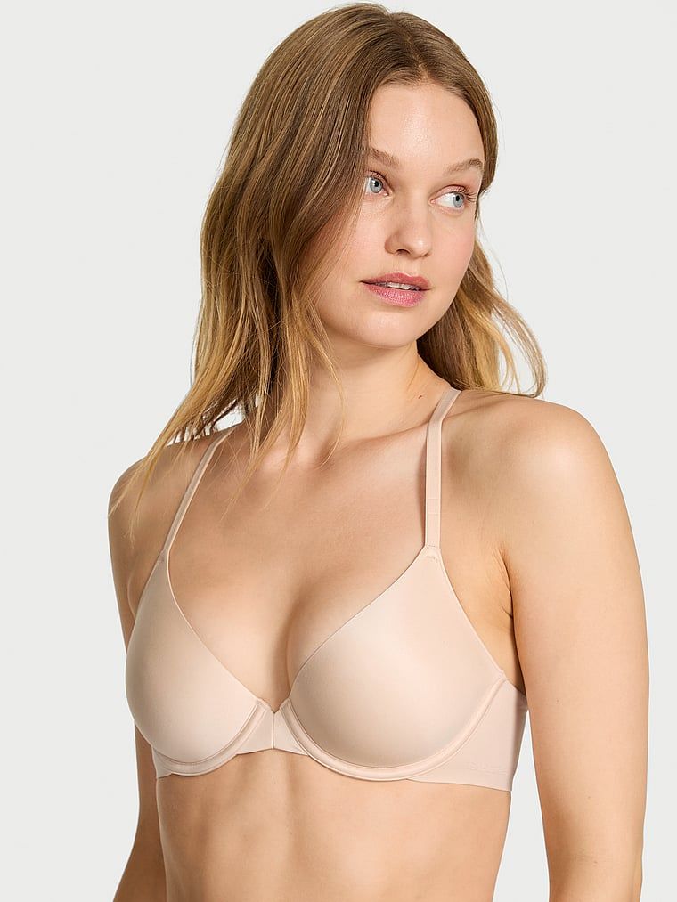 Sutien ușor căptușit închis în față. Produsul este de culoare bej și provine din colecția Body by Victoria.