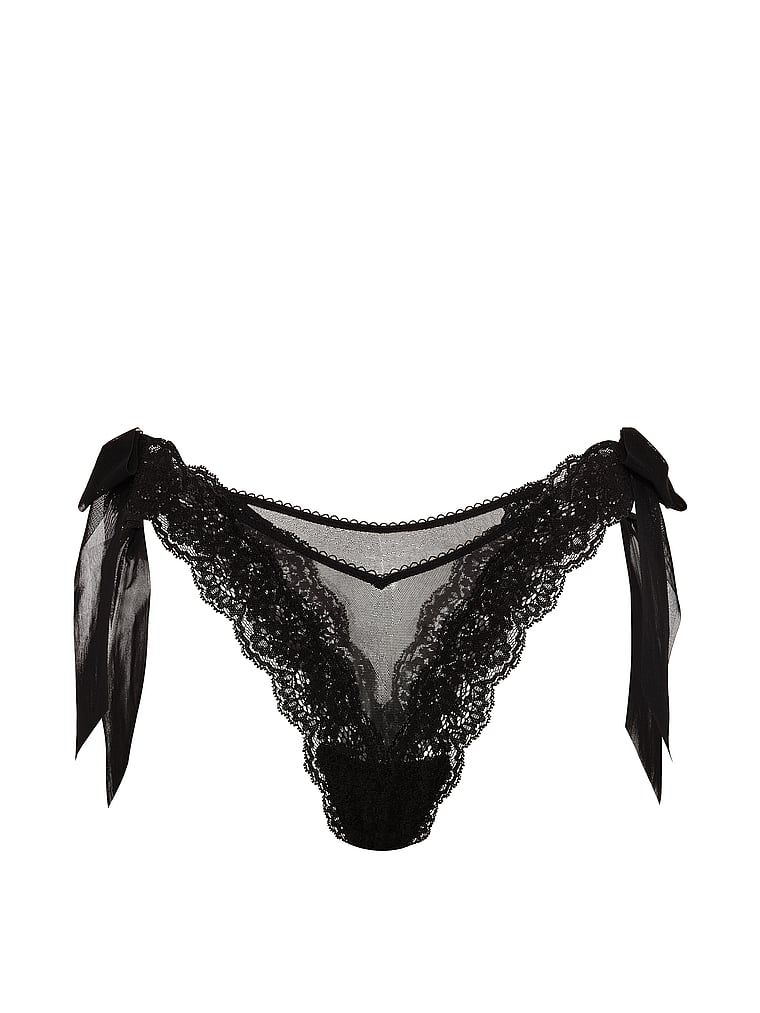 Chiloți brazilieni cu fundițe pe laterale, dantelă și Mesh Side-Bow. Produsul este negru și provine din colecția Dream Angels.