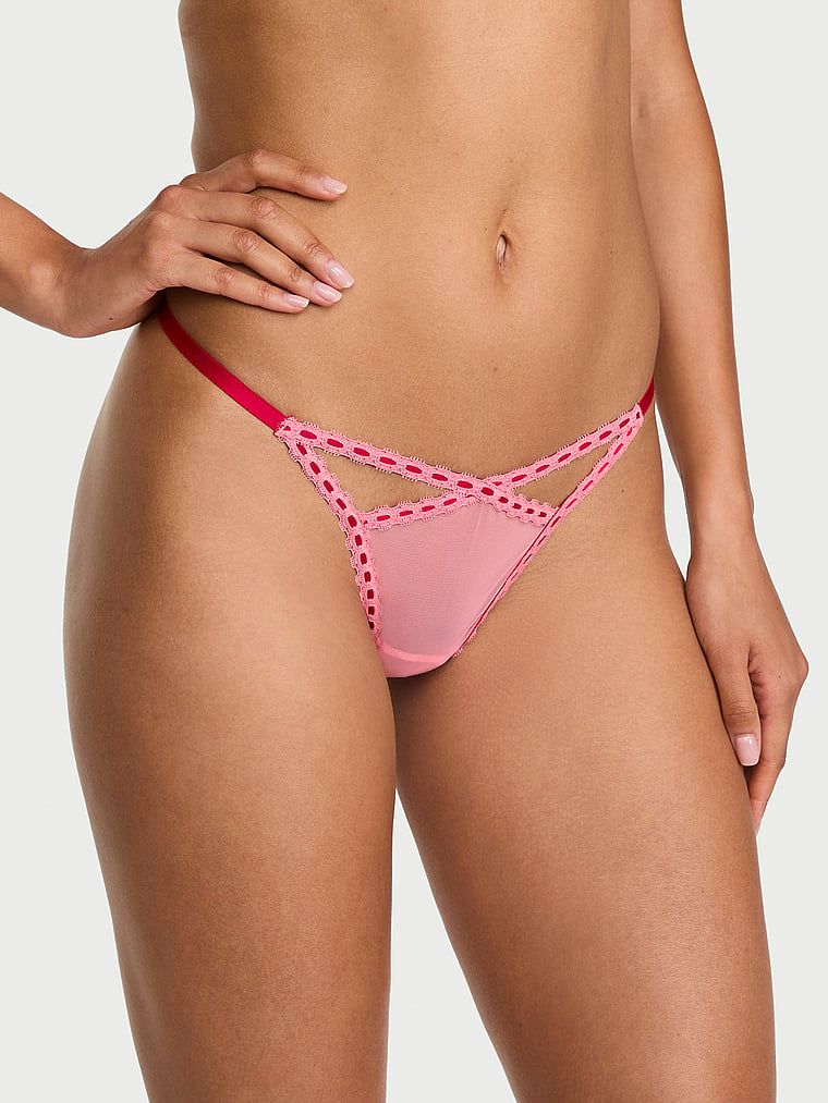 Tanga din plasă Ribbon Lot. Produsul este roz și provine din colecția Dream Angels.