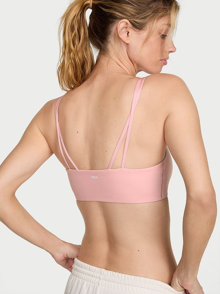 Sutien sport VSX Elevate. Produsul este roz și provine din colecția VSX.