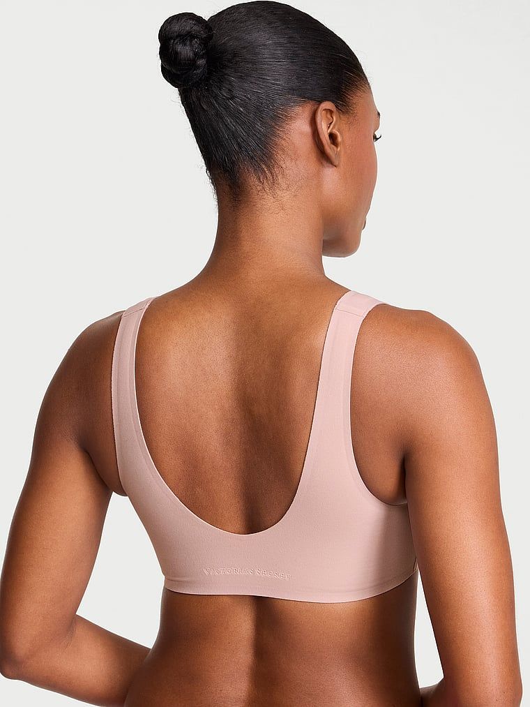 SlumberBra pentru zi cu zi și pentru somn. Produsul este de culoare bej și provine din colecția de tricouri.