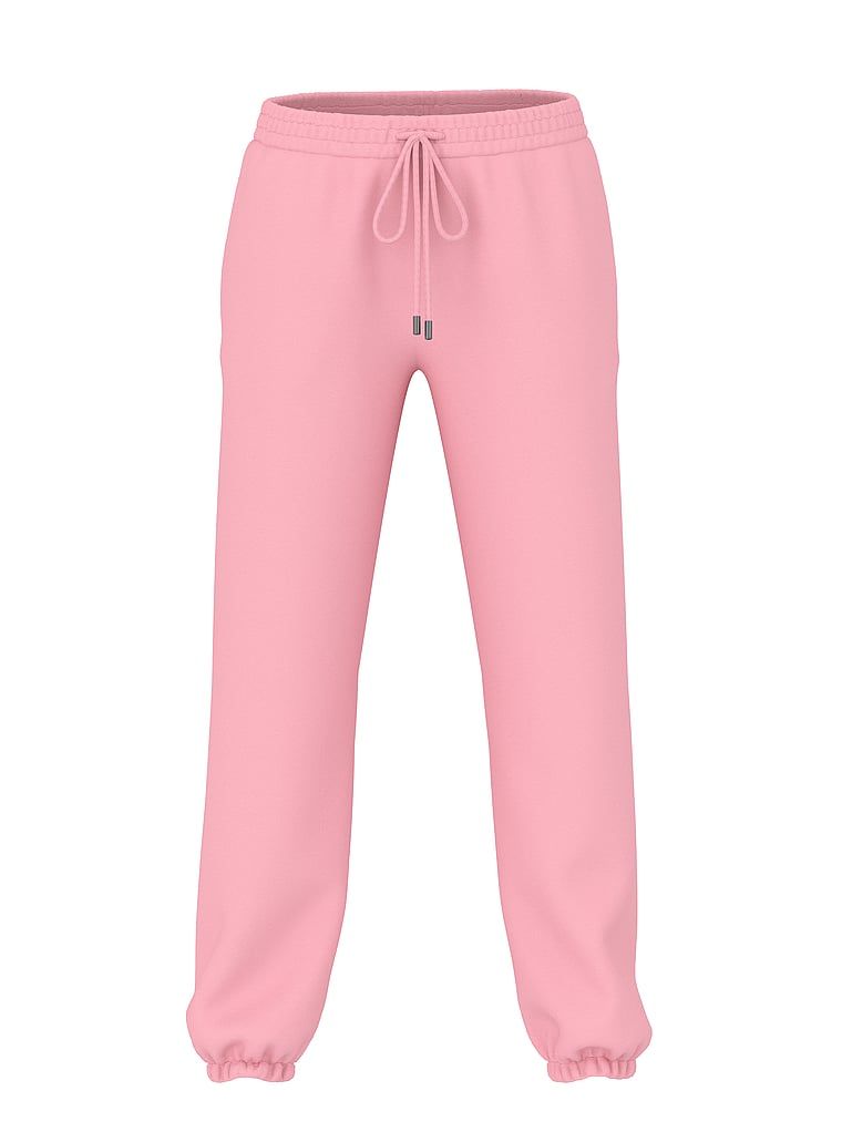 Pantaloni de trening din bumbac în afara serviciului. Produsul este roz și provine din colecția Angel Essentials.