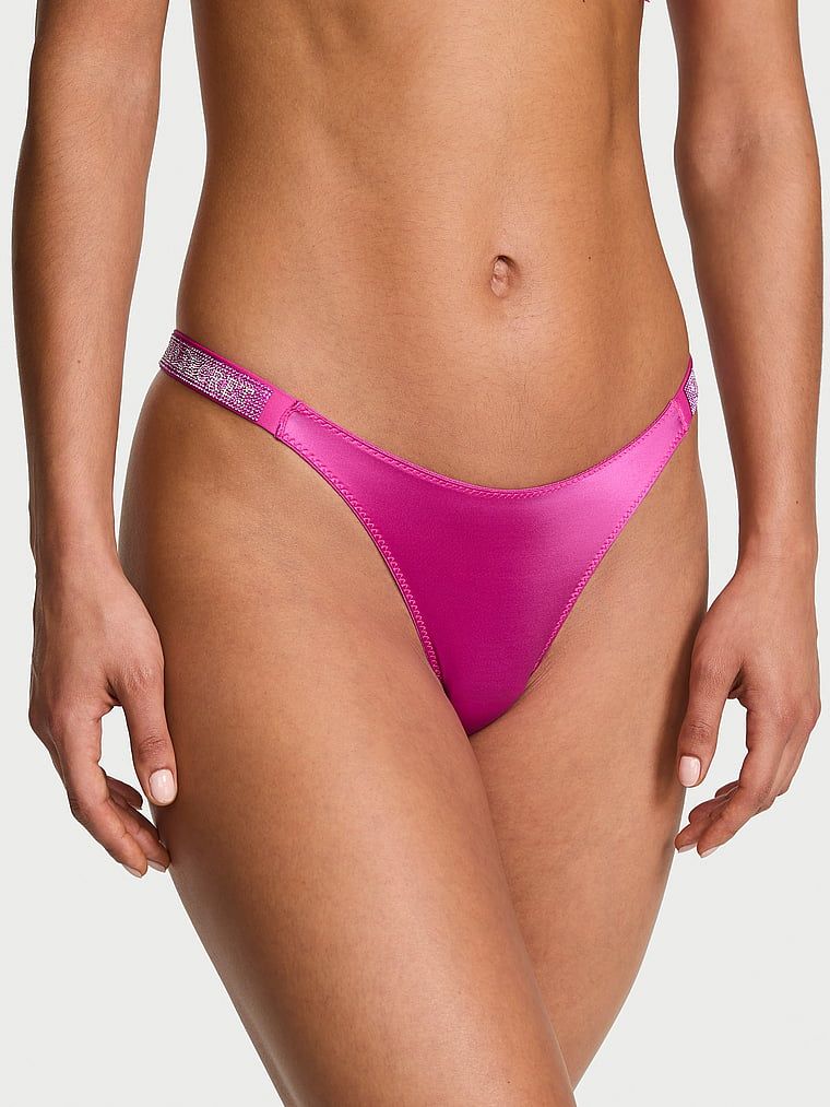 Tanga cu curele lucioase Shine Strap. Produsul este roz și provine din colecția Very Sexy.