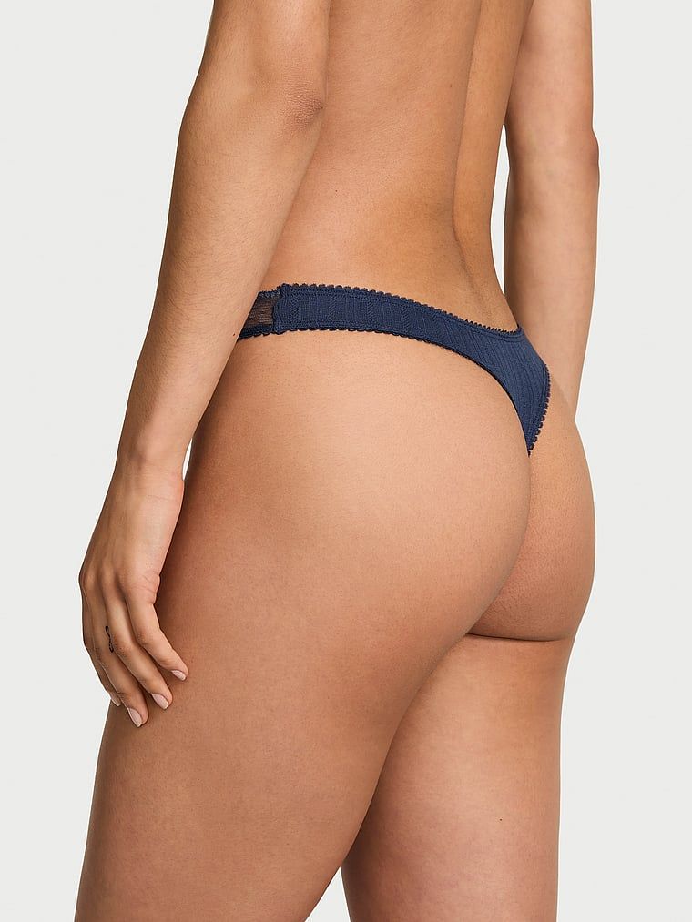 Tanga cu decolț înalt cu dantelă Pointelle. Produsul este albastru și provine din colecția Victoria's Secret.
