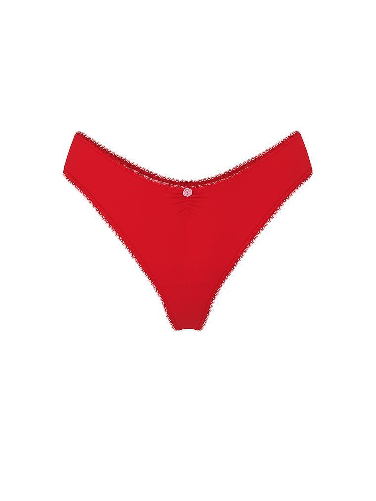 Tanga de bumbac cu plasă la spate, dantelă de inimă. Produsul este roșu și provine din colecția Victoria's Secret.