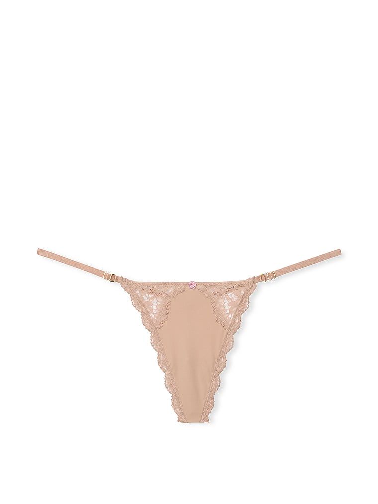 Tanga din dantelă cu bretele reglabile Lace-Trim V-String. Produsul este bej și provine din colecția Dream Angels.