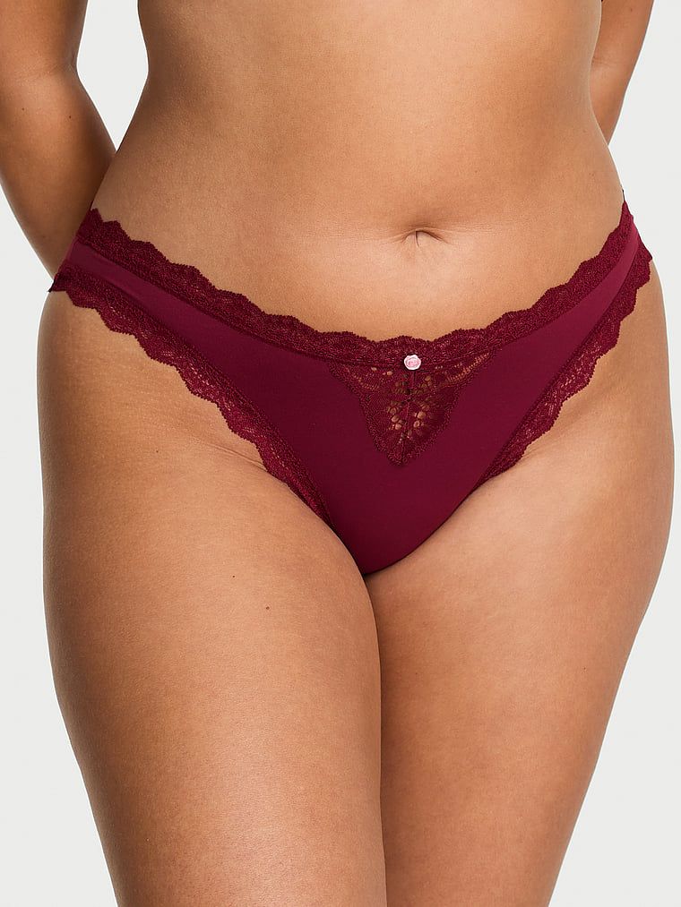 Chiloți din dantelă pe marginile bikinilor cu dantelă. Produsul este de culoare roșie și provine din colecția Dream Angels.
