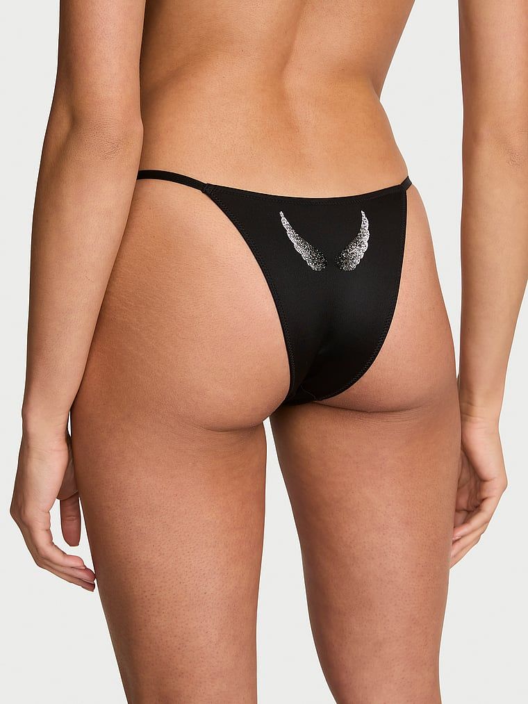 Chiloți brazilieni cu aripioare Angel Shine. Produsul este negru și provine din colecția Very Sexy.