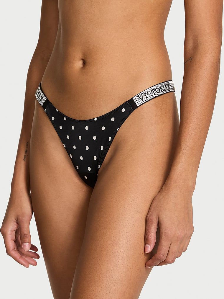 Chiloți brazilieni cu dungi braziliene Shine Trap. Produsul este modelat și provine din colecția Very Sexy.