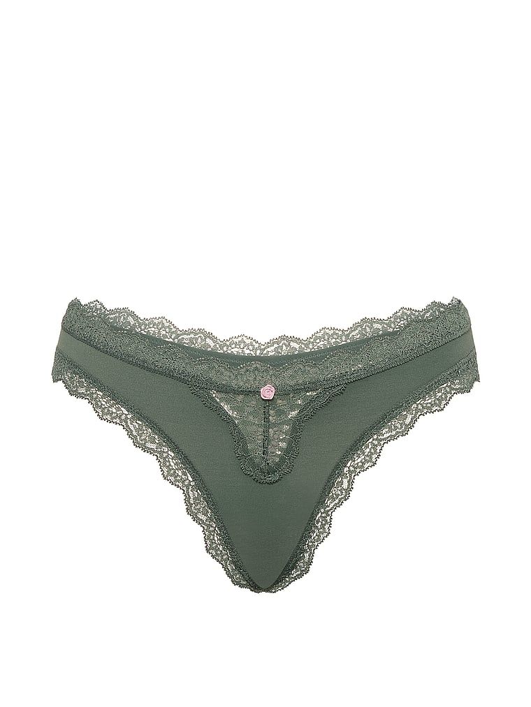Tanga cu dantelă și margini în dantelă. Produsul este verde și provine din colecția Dream Angels.