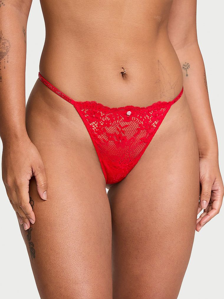 Tanga din dantelă Twinkle Strap. Produsul este roșu și provine din colecția Dream Angels.